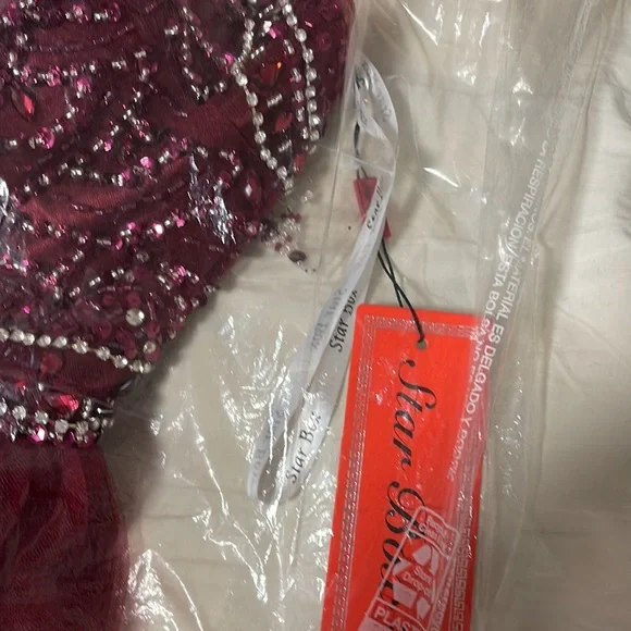 Party dress. Burgundy color. Never used, brand new.